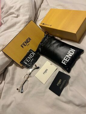 Fendi Clear Lens Eyeglasses with Gold Metal Accents and Black Case